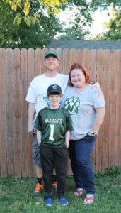 Northwest Missouri online MBA graduate Kelly Towne with her family